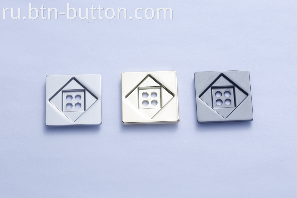 Custom metal alloy buttons for coats